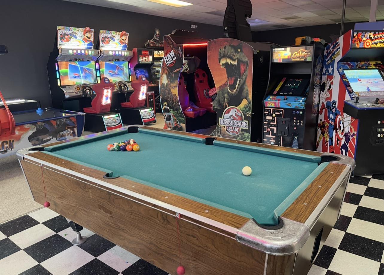 Pool table and dartboard area